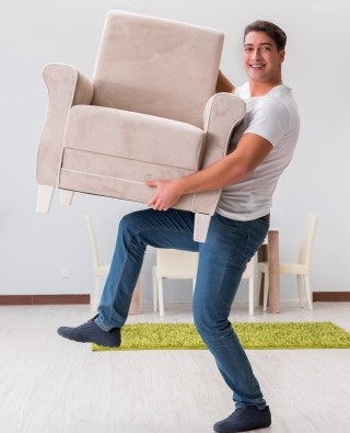 man-moving-furniture-home_85869-613